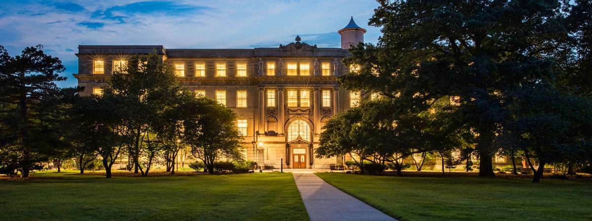 College of Engineering building at night.